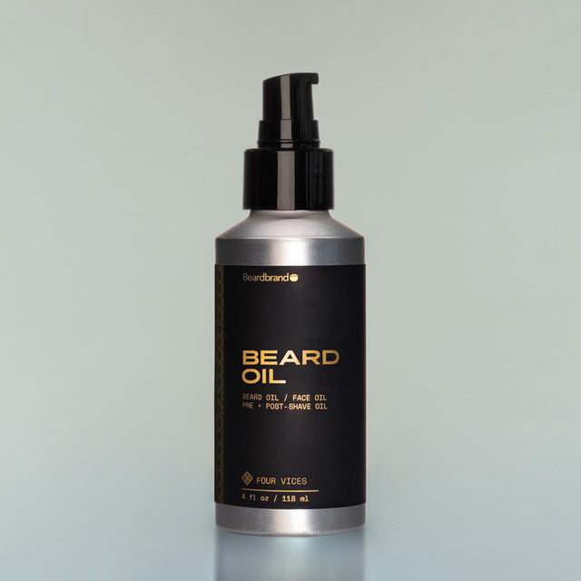 A bottle of Four Vices full-size Beard Oil with a pump dispenser against a grey background.