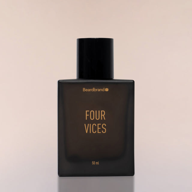 An square bottle of Beardbrand Four Vices Eau de Parfum against a neutral background.