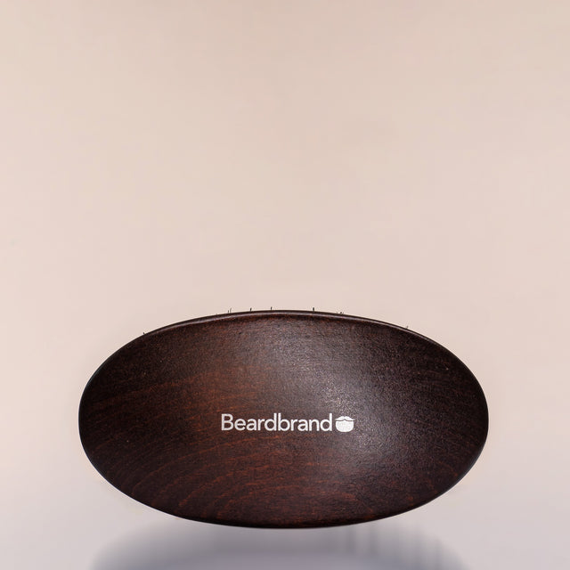 A Beardbrand 100% Boar’s Hair Oval Brush top view.