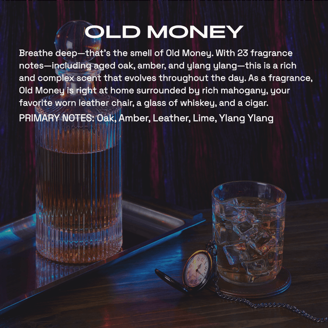 Fragrance graphic titled ‘Old Money’ over a dark wood background with a crystal decanter and pocket watch beside a glass of whiskey, describing a rich blend of aged oak, amber, leather, lime and ylang ylang notes.