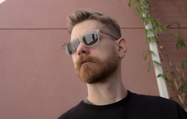 Close up of Eric Bandholz with a short, well-groomed beard. 