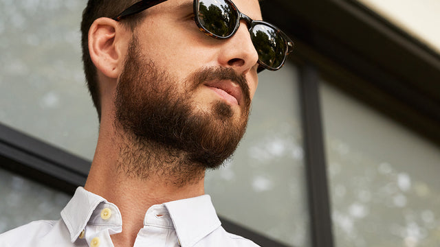 Closeup of a man's face in the 3rd stage of beard growth.