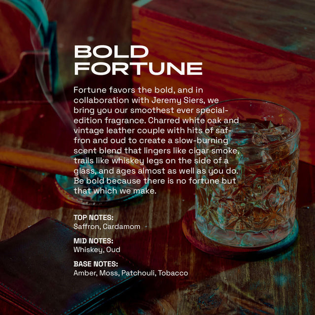 Bold Fortune special edition fragrance product card featuring a whiskey glass on rich wooden surface with warm amber lighting. Collaboration with Jeremy Siers featuring saffron, cardamom top notes, whiskey and oud mid notes, with amber, moss, patchouli, and tobacco base notes.