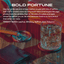 Fragrance graphic titled ‘Bold Fortune’ over a wooden tabletop with a crystal glass of whiskey and leather wallet, describing a charred white oak and vintage leather scent with saffron, oud and tobacco notes.