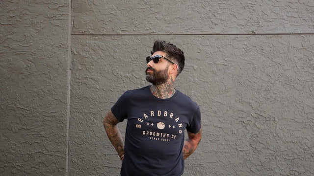 Carlos Costa wearing a Beardbrand Banner Tee