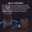Fragrance graphic titled ‘Old Money’ over a dark wood background with a crystal decanter and pocket watch beside a glass of whiskey, describing a rich blend of aged oak, amber, leather, lime and ylang ylang notes.