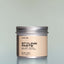A container of Temple Smoke Styling Paste against a grey background.