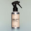 A bottle of Tree Ranger Sea Salt Spray with a sprayer dispenser against a grey background.