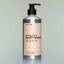 A bottle of Temple Smoke Utility Softener with a pump dispenser against a grey background.