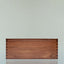 The black walnut Beardbrand Beardsman’s Box shown from the front with the lid closed.