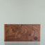 The black walnut Beardbrand Beardsman’s Box shown from the top with the lid closed.